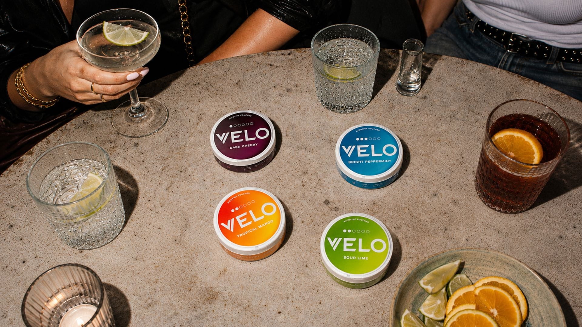 Table with VELO cans