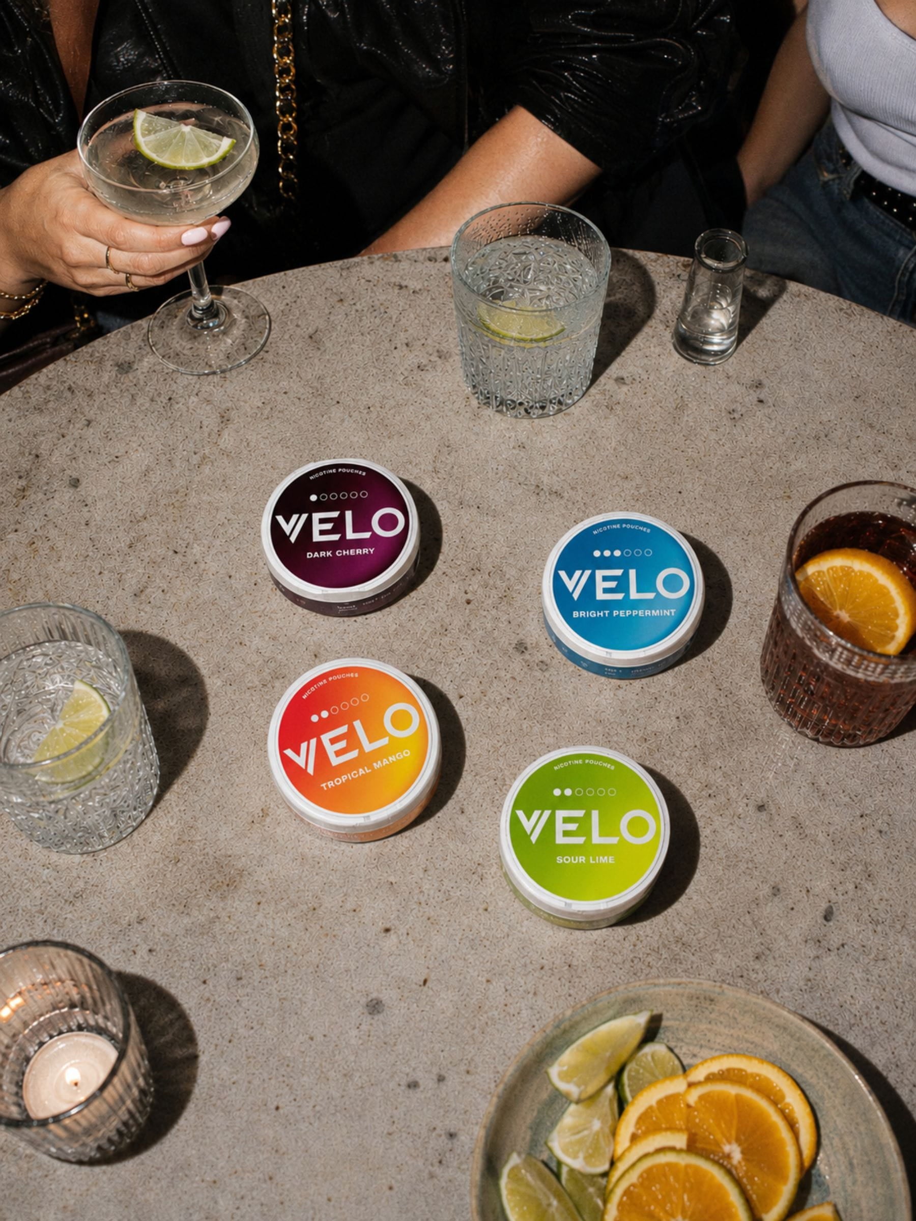 Table with VELO cans